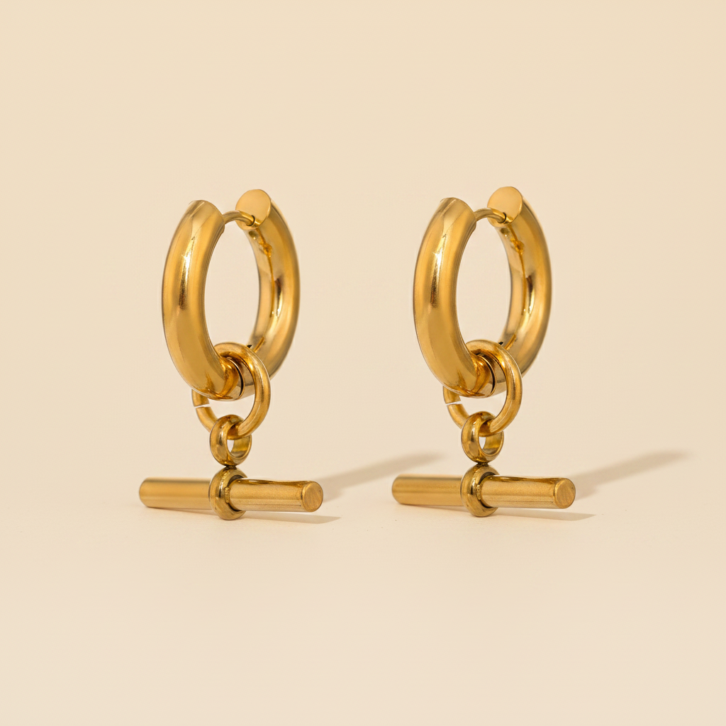 Nova Geometric Huggie Earrings — Gold